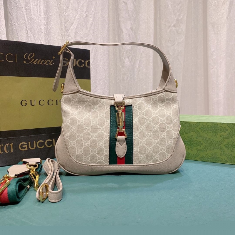 G*u*i top handle bags